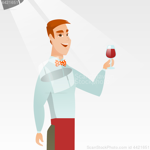 Image of Bartender holding a glass of wine in hand.