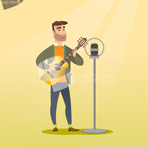 Image of Man singing into a microphone.