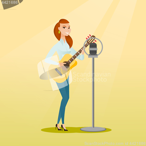 Image of Woman singing into a microphone.