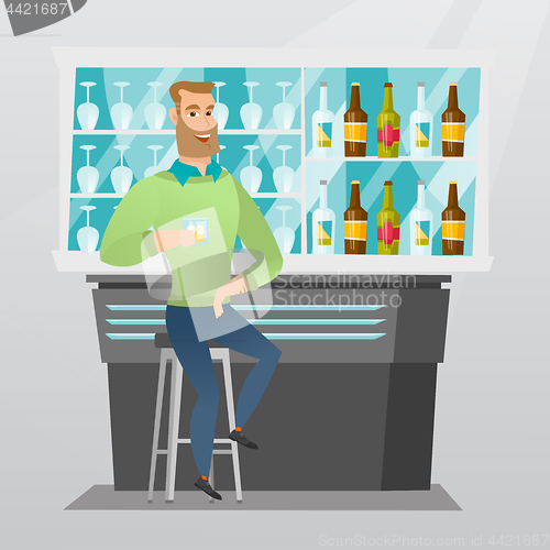 Image of Caucasian man sitting at the bar counter.
