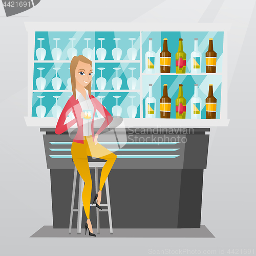 Image of Caucasian woman sitting at the bar counter.