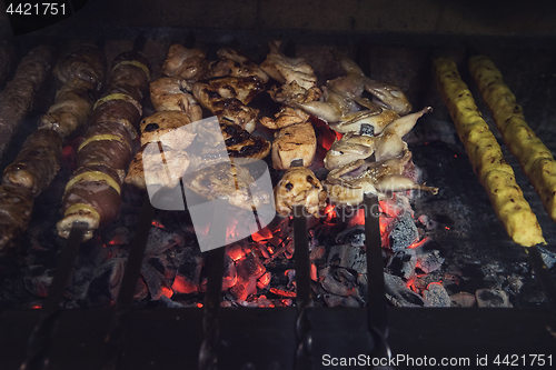 Image of Grilling marinated shashlik