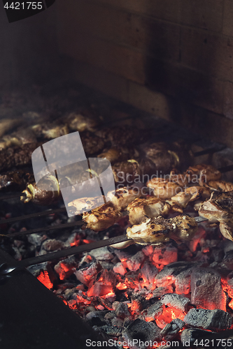 Image of Grilling marinated shashlik
