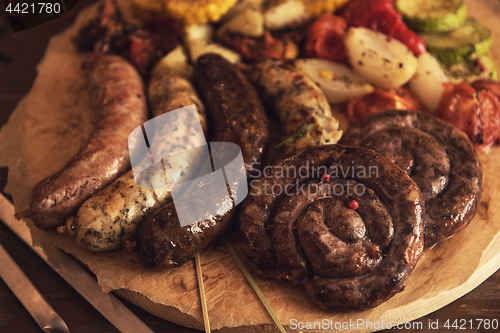 Image of Grilled sausages with vegetables