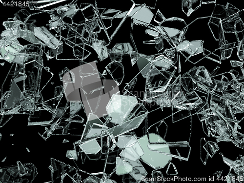 Image of Pieces of broken or cracked glass on black