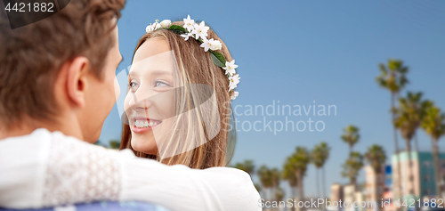 Image of close up of happy smiling young hippie couple