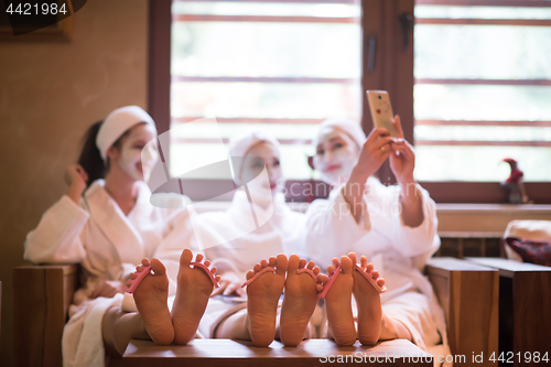 Image of group of famale friends in spa