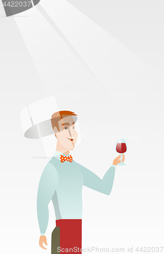 Image of Bartender holding a glass of wine in hand.