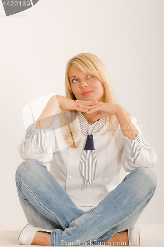 Image of Positive woman sitting