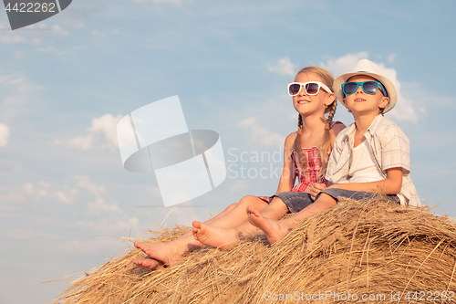 Image of Happy children playing in the park at the day time.