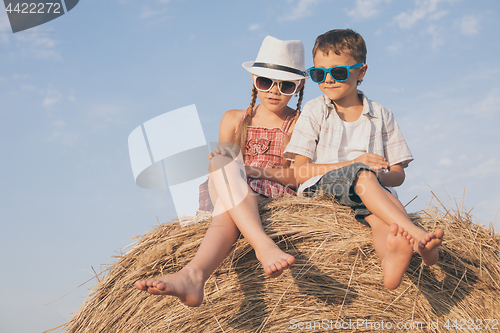 Image of Happy children playing in the park at the day time.