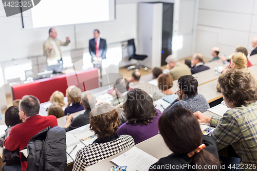 Image of Business speaker giving a talk at business conference event.