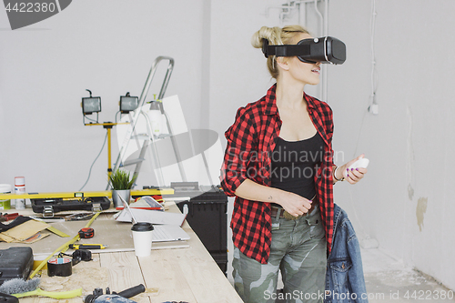 Image of Female in virtual reality headset in workshop 