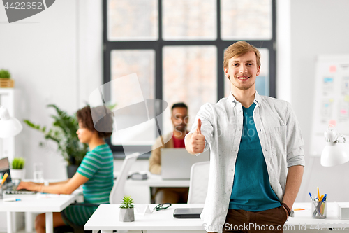 Image of happy smiling man at office