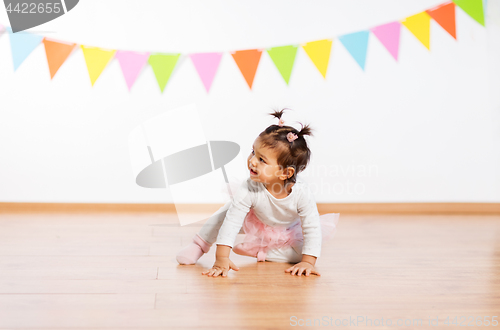 Image of happy baby girl on birthday party