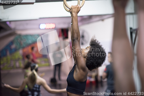 Image of black woman doing dipping exercise