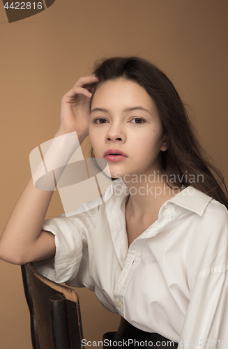 Image of Stylish young teen girl over gray background