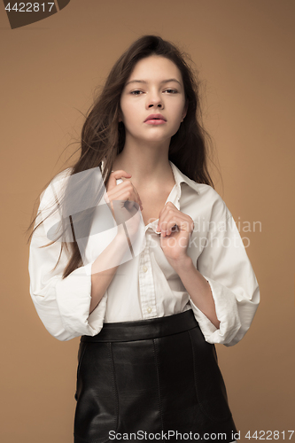 Image of Stylish young teen girl over gray background