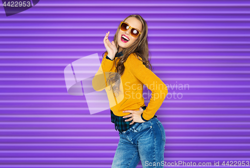 Image of happy young woman or teen girl in casual clothes