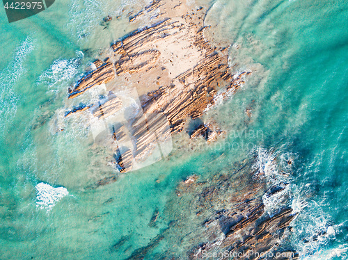 Image of Rocks being swallowed up by the ocean