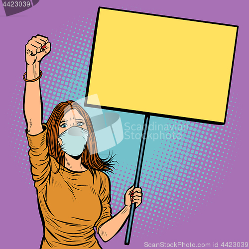 Image of woman in medical mask protests with a poster