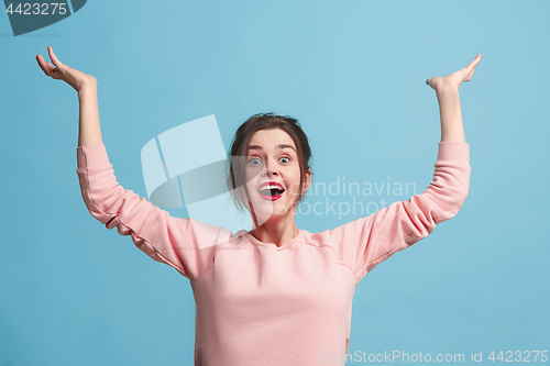 Image of Winning success woman happy ecstatic celebrating being a winner. Dynamic energetic image of female model