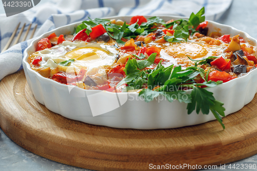 Image of Homemade spicy shakshuka with eggs.