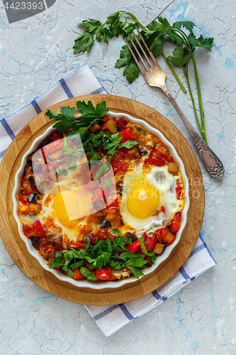 Image of Dish is a traditional Israeli food shakshuka.