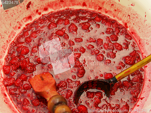Image of Raspberry jam in dishes