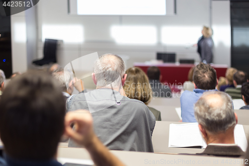 Image of Business speaker giving a talk at business conference event.