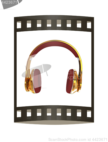 Image of Golden headphones. 3d illustration. The film strip.