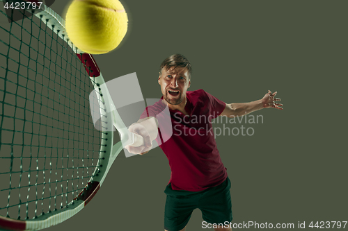 Image of one caucasian man playing tennis player isolated on white background