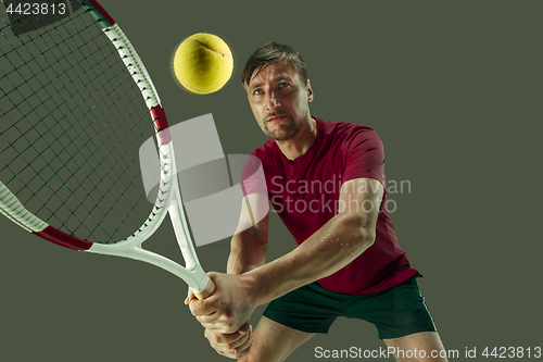 Image of one caucasian man playing tennis player isolated on white background