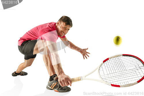 Image of one caucasian man playing tennis player isolated on white background