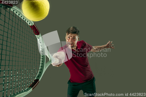 Image of one caucasian man playing tennis player isolated on white background