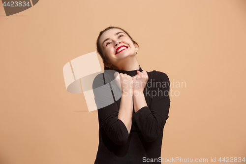 Image of Winning success woman happy ecstatic celebrating being a winner. Dynamic energetic image of female model