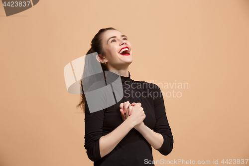 Image of Winning success woman happy ecstatic celebrating being a winner. Dynamic energetic image of female model