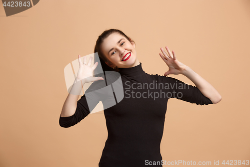 Image of Winning success woman happy ecstatic celebrating being a winner. Dynamic energetic image of female model