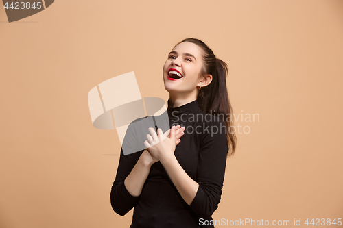 Image of Winning success woman happy ecstatic celebrating being a winner. Dynamic energetic image of female model