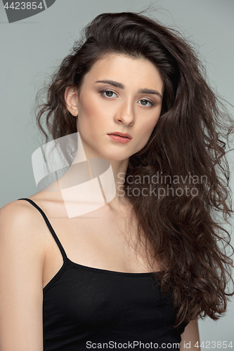 Image of Beauty portrait of a charming woman looking at camera