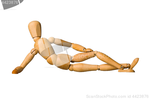 Image of Wooden mannequin lying down