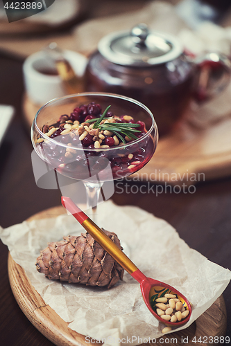 Image of dessert from beriies with pine seed