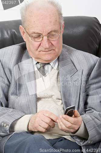 Image of Senior using a mobile phone