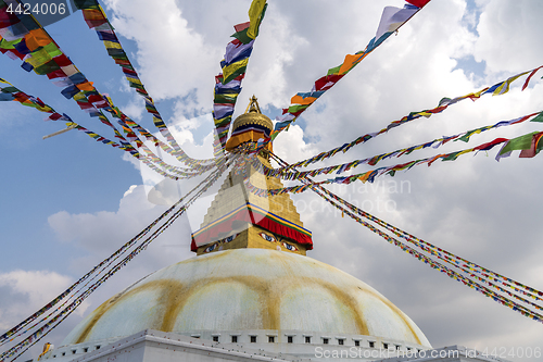 Image of Boudhanath Stupa in Kathmandu and buddhist prayer flags