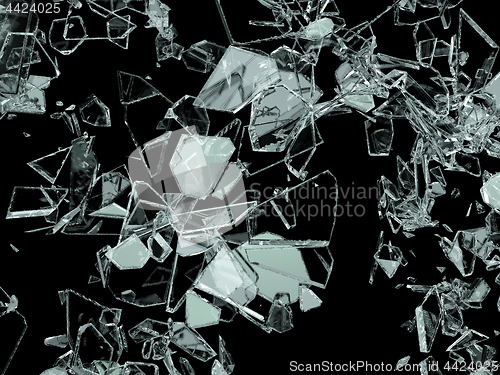 Image of Pieces of broken or cracked glass on black