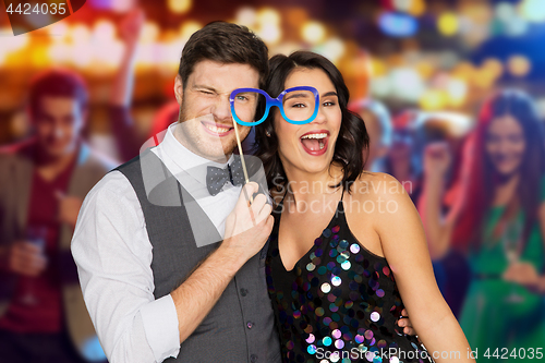 Image of happy couple with party glasses having fun