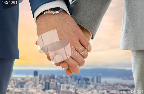 Image of close up of male gay couple over san francisco