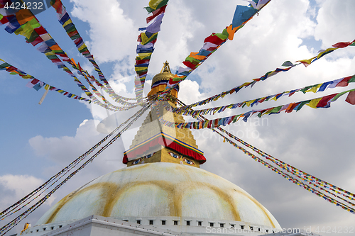 Image of Boudhanath Stupa in Kathmandu and buddhist prayer flags