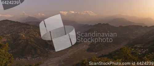 Image of Annapurna range with Machapuchare and villages on hills