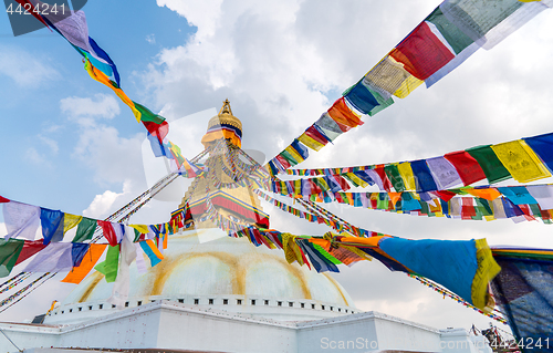 Image of Boudhanath Stupa and prayer flags in Kathmandu